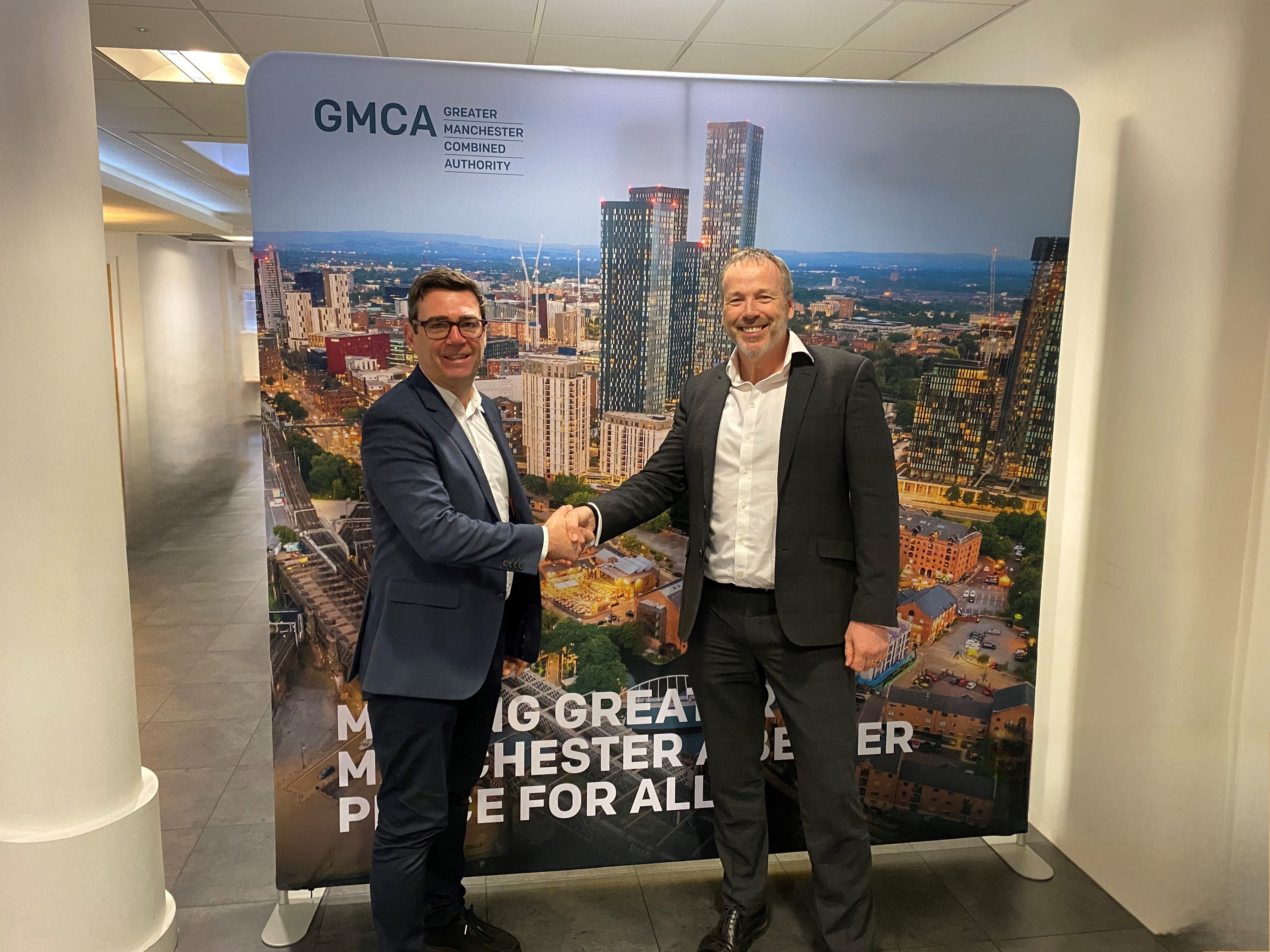 Mayor of Greater Manchester, Andy Burnham shakes hands